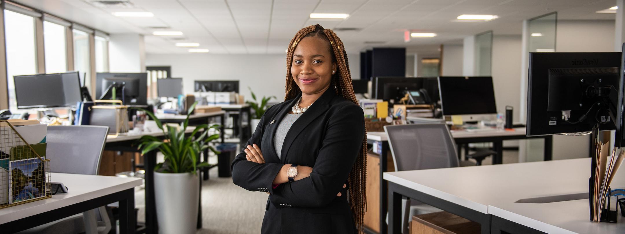 Female business student posing indoors.